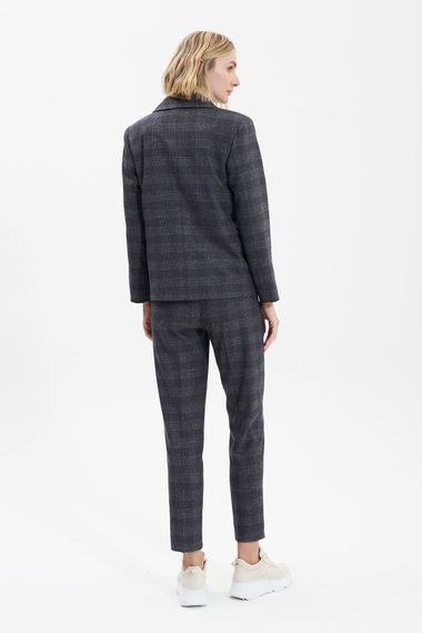 UNQ Брюки в клетку