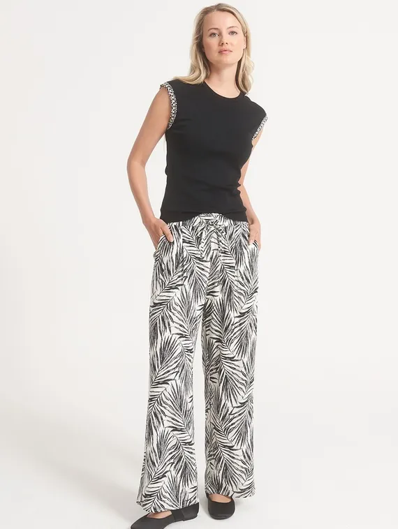 UNQ Брюки с принтом листья