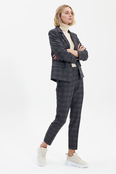 UNQ Брюки в клетку